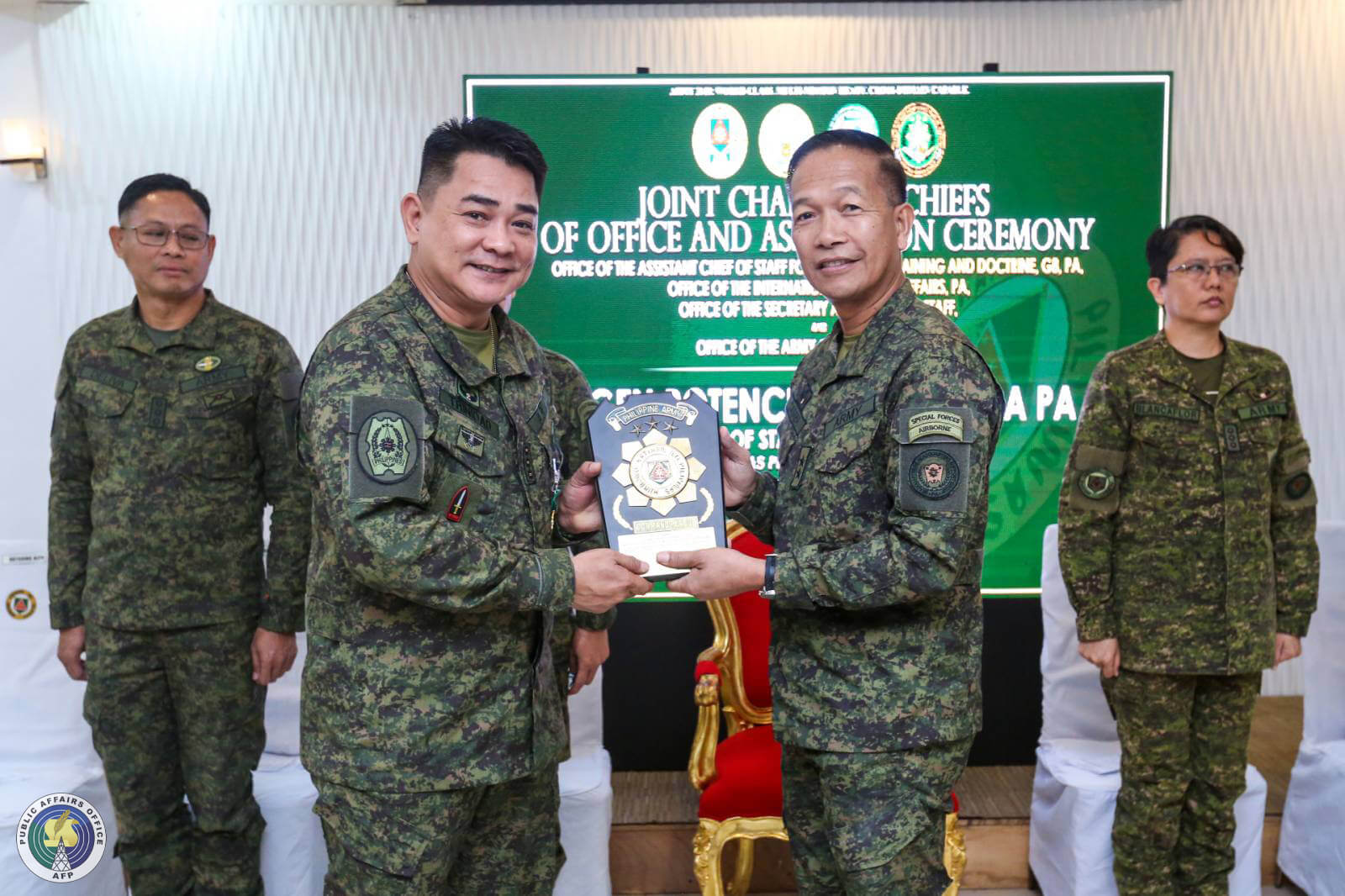 MGen Potenciano Camba, Chief of Staff, Philippine Army presents the Command Plaque to Col. Xerxes Trinidad PA during the Change of Chief of Office Ceremony of the Office of the Army Chief Public Affairs on November 7, 2023 in Fort Bonifacio, Taguig City. PASSING THE TORCH | OACPA