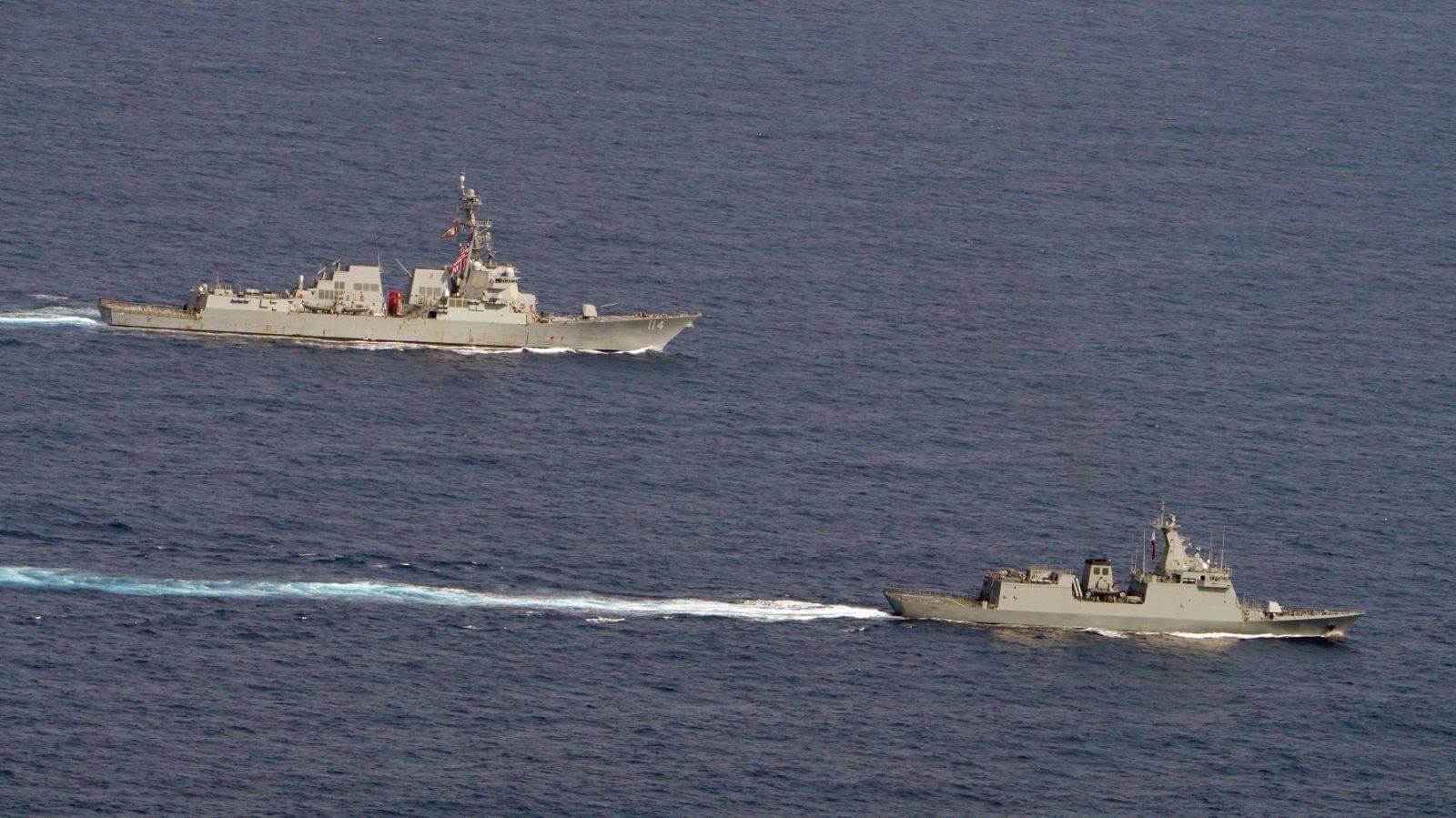 Philippine Navy’s BRP Jose Rizal (FF150) and US Navy’s USS Ralph Johnson sail through Philippine waters to carry out Division Tactics rehearsal.